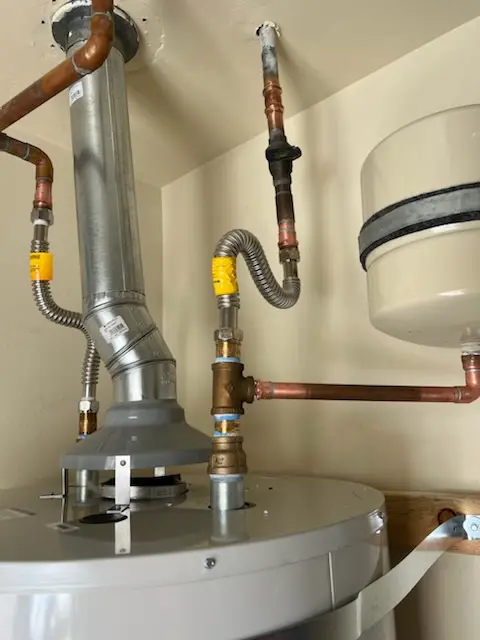 Water heater installation and plumbing repair in Carriage Stop